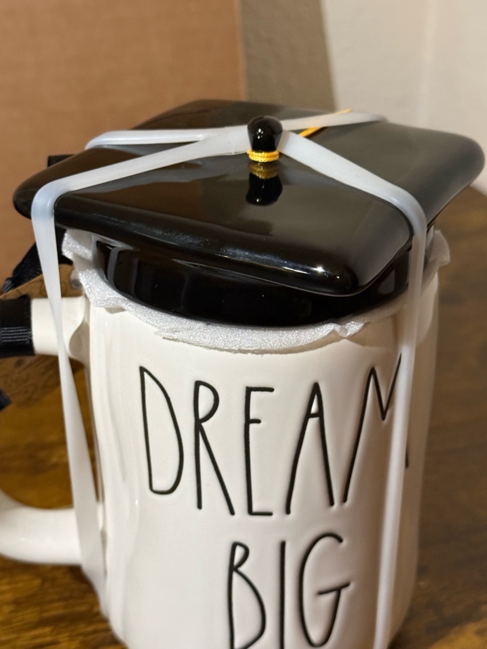 Rae Dunn Peanuts White Ceramic 'Dream Big' Mug with Black Cap & Tassel - Picture 2 of 6